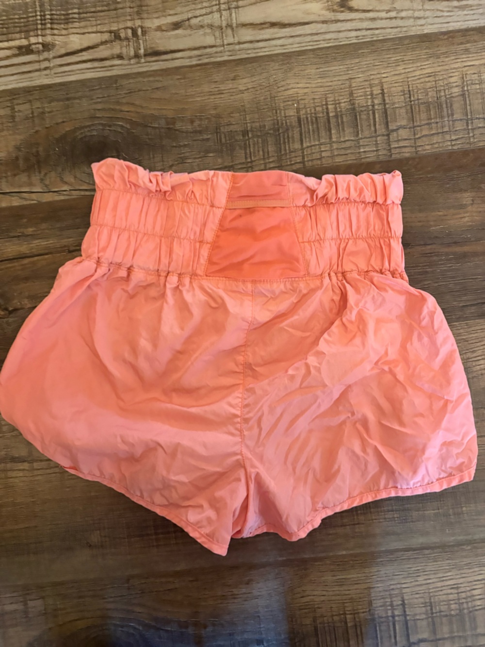 Free People Coral Pink Smocked Waist Ruffle Shorts - Picture 2 of 3